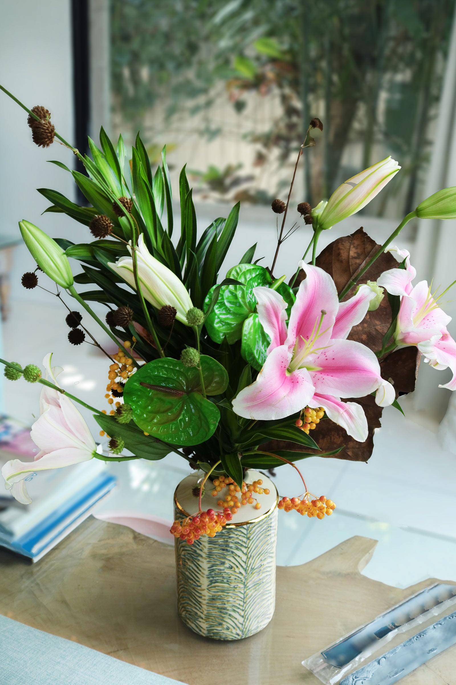 Bouquet of flowers in a vase on a table with a blurred background