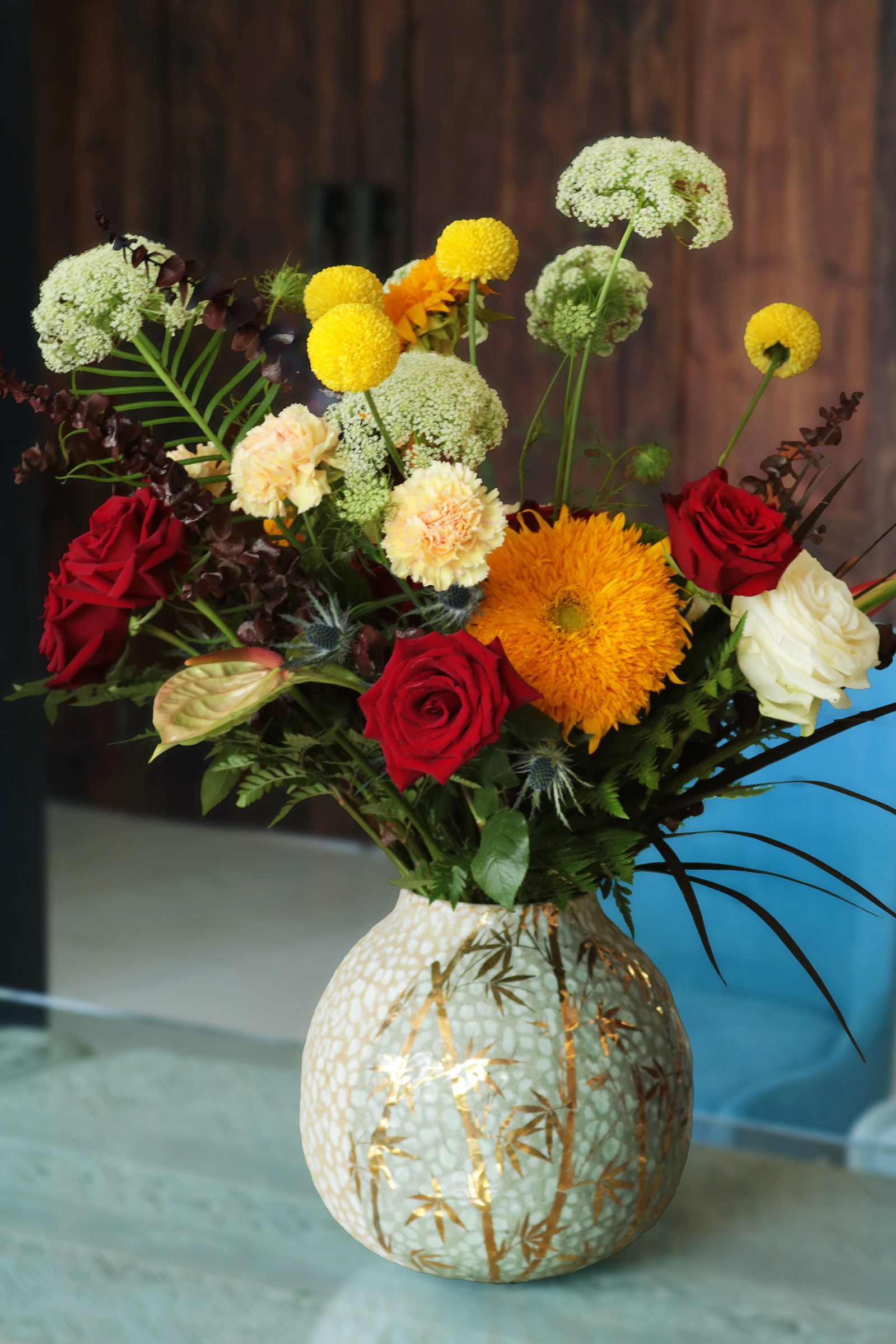 Bouquet of flowers in a decorative vase on a table